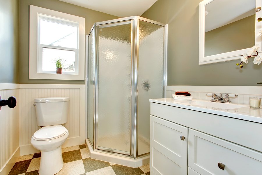 Great Blend Of White Bathroom Cabinets With Olive Walls.